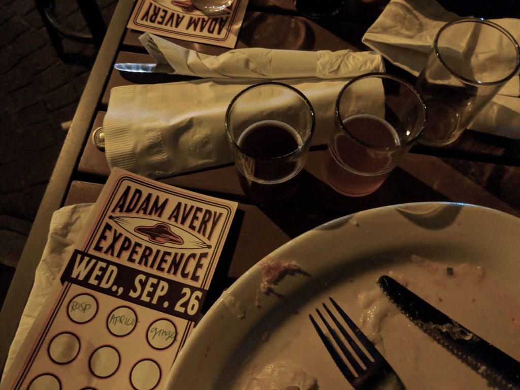 Beer samples, empty plate and tasting card.