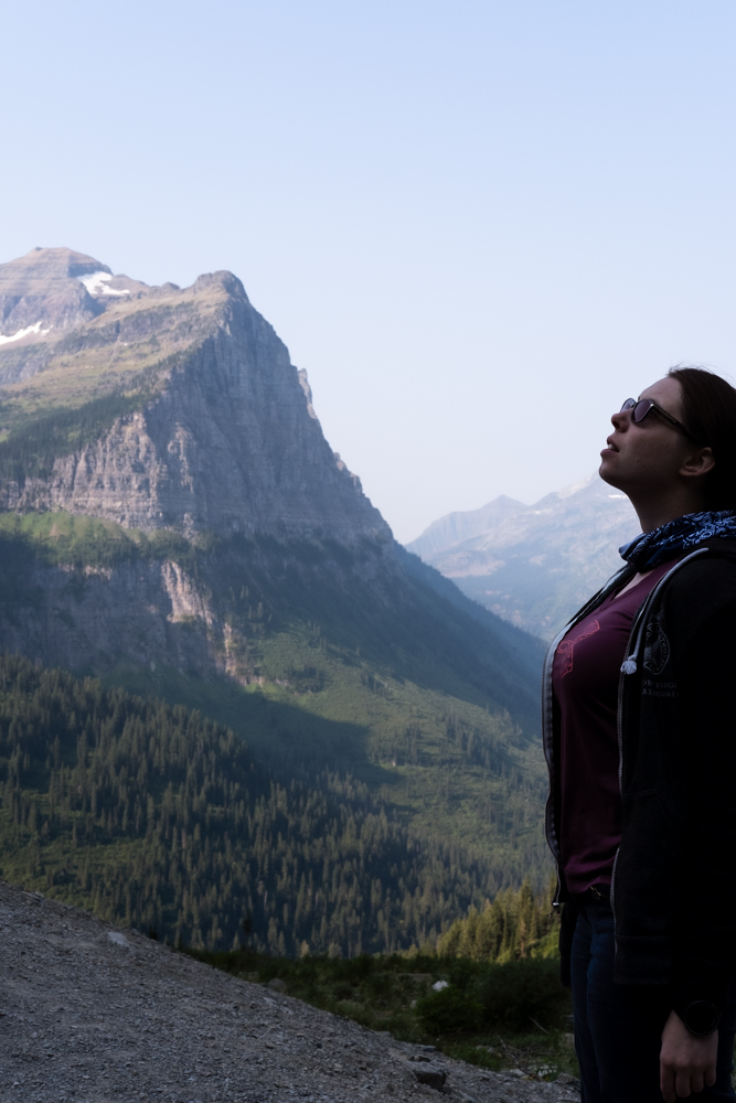 Meagan Wilson gazing up at the mountains in Glacier National Park