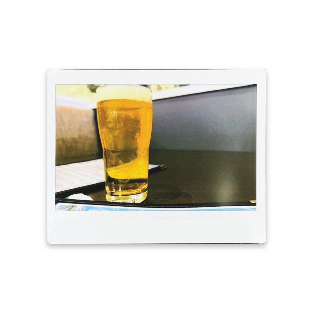 Instax Wide photo of 10 oz. glass of Pliny the Elder sitting on a table