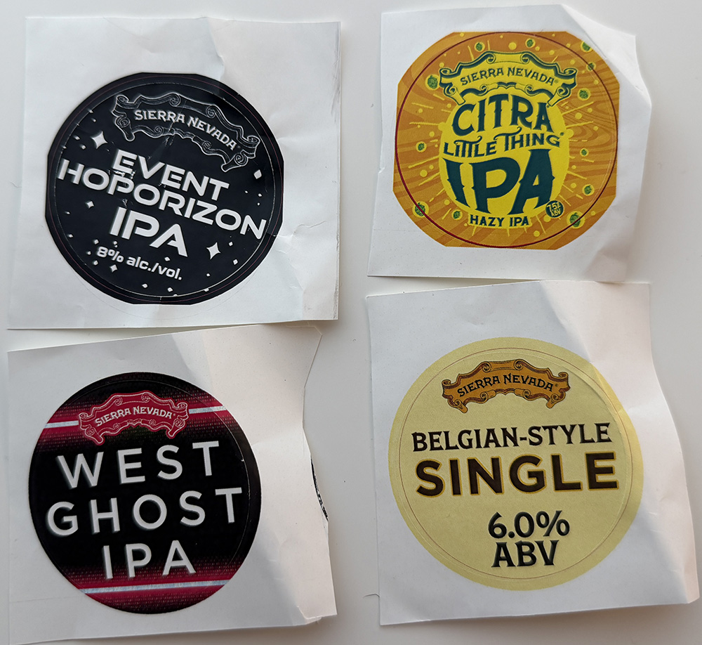 Four stickers of Sierra Nevada beer labels. The labels are Event Horizon IPA, Citra Little Thing IPA, West Ghost IPA, and Belgian-style Single.
